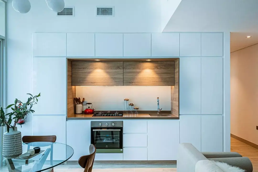 Studio One — Must Have — Closed Kitchen — feature | Profound Properties, Dubai